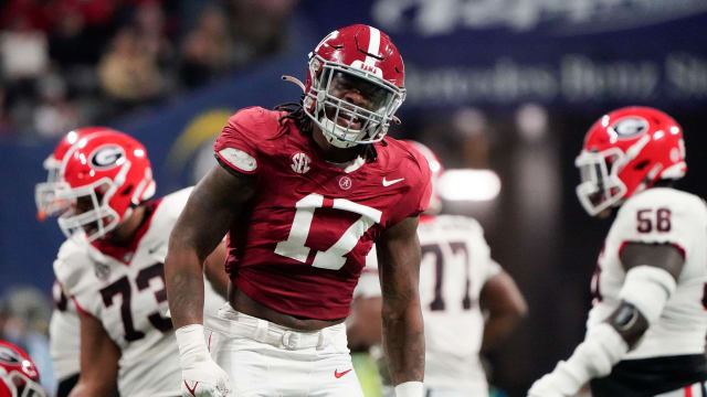 Dec 2, 2023; Atlanta, GA, USA; Alabama Crimson Tide linebacker Trezmen Marshall (17) celebrates after making a stop against the Georgia Bulldogs at Mercedes-Benz Stadium. Mandatory Credit: Gary Cosby Jr.-USA TODAY Sports  